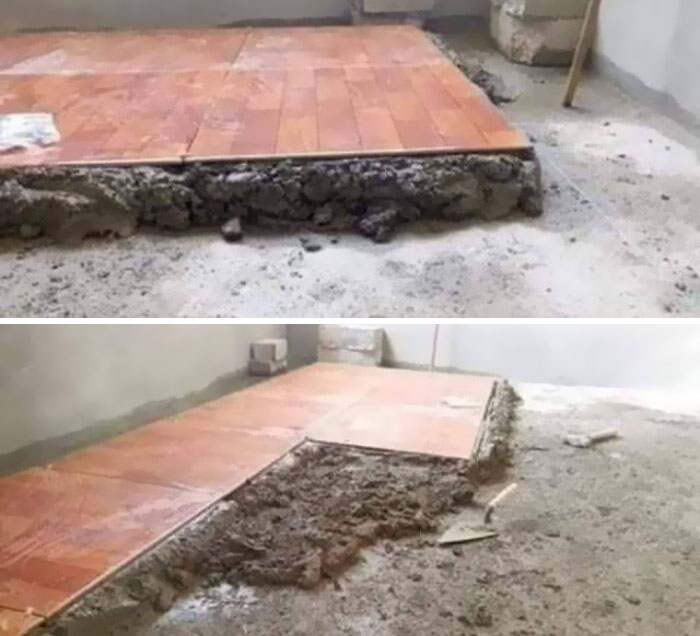 Crumbled concrete under poorly laid tiles, showcasing architecture fails.