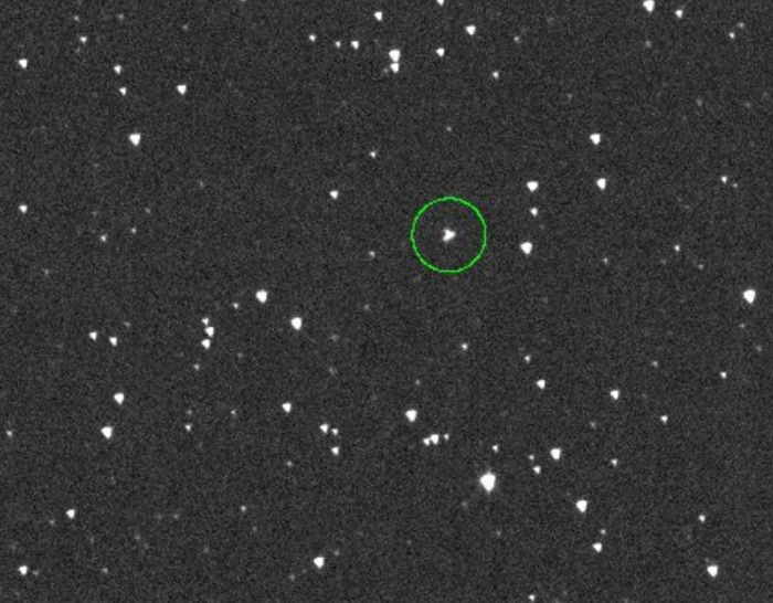 Asteroid threat highlighted with a green circle in a starry sky image for 2032 potential impacts. Asteroid threat highlighted with a green circle in a starry sky image for 2032 potential impacts.