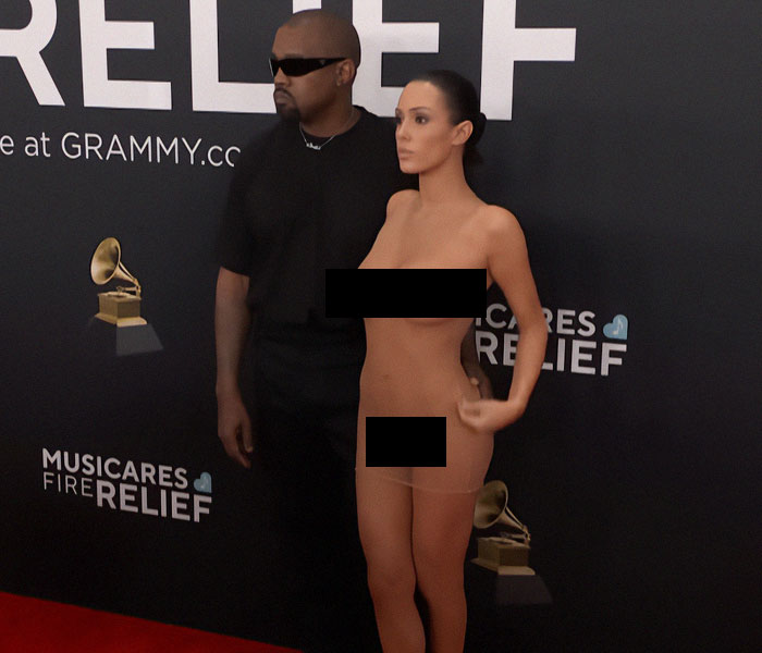 Man and mannequin on 2025 Grammy Awards red carpet, creating an awkward moment.