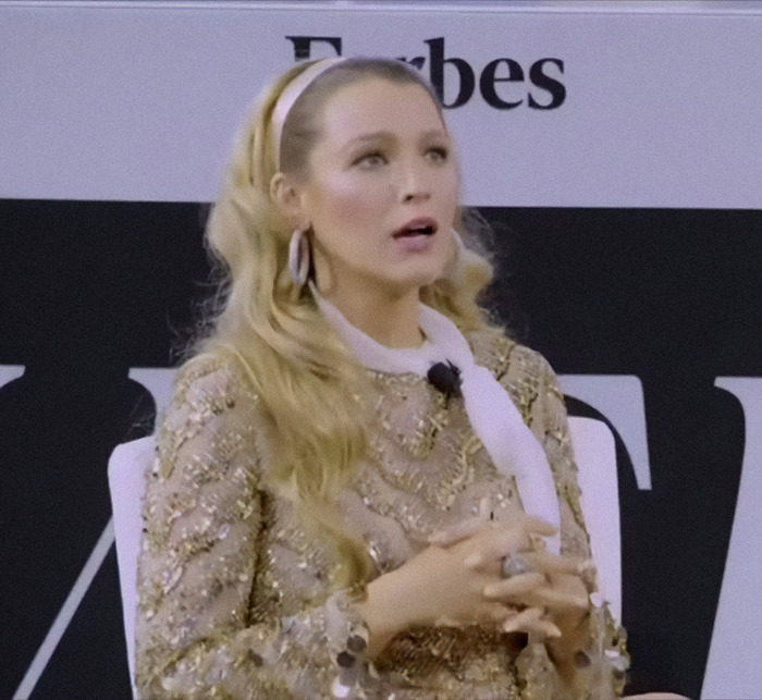 Blake Lively wearing a jeweled dress at a Forbes event.