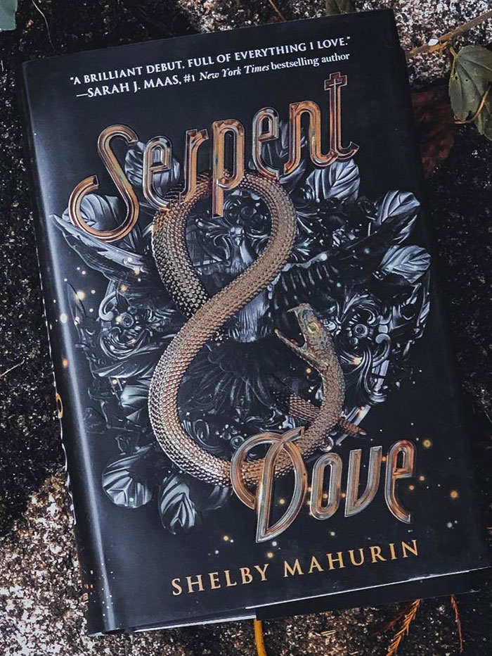 Book cover of "Serpent & Dove" by Shelby Mahurin on a dark background.