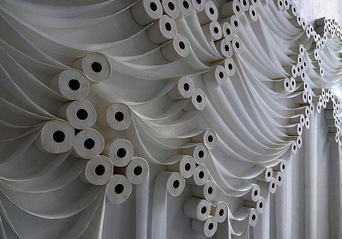 Toilet paper wall decor as a budget wedding fails example.