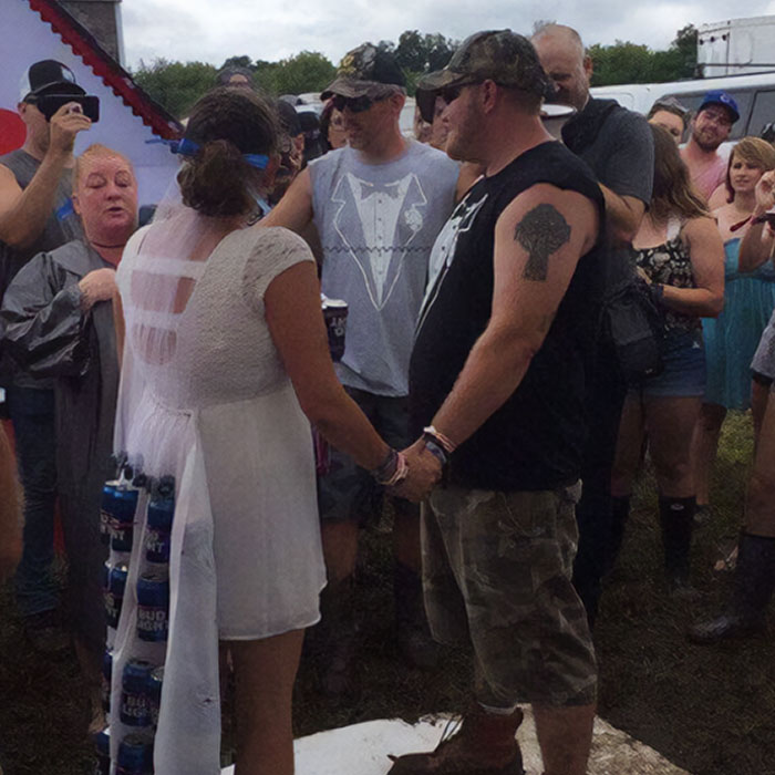 Casual outdoor wedding scene with unique dress and guests, highlighting budget-wedding-fails concepts.