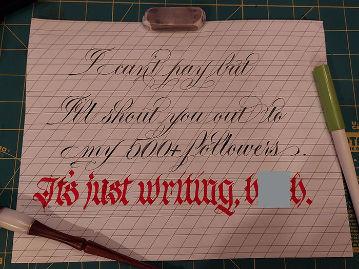 Calligraphy on grid paper with pen nearby, symbolizing budget wedding fail negotiation.