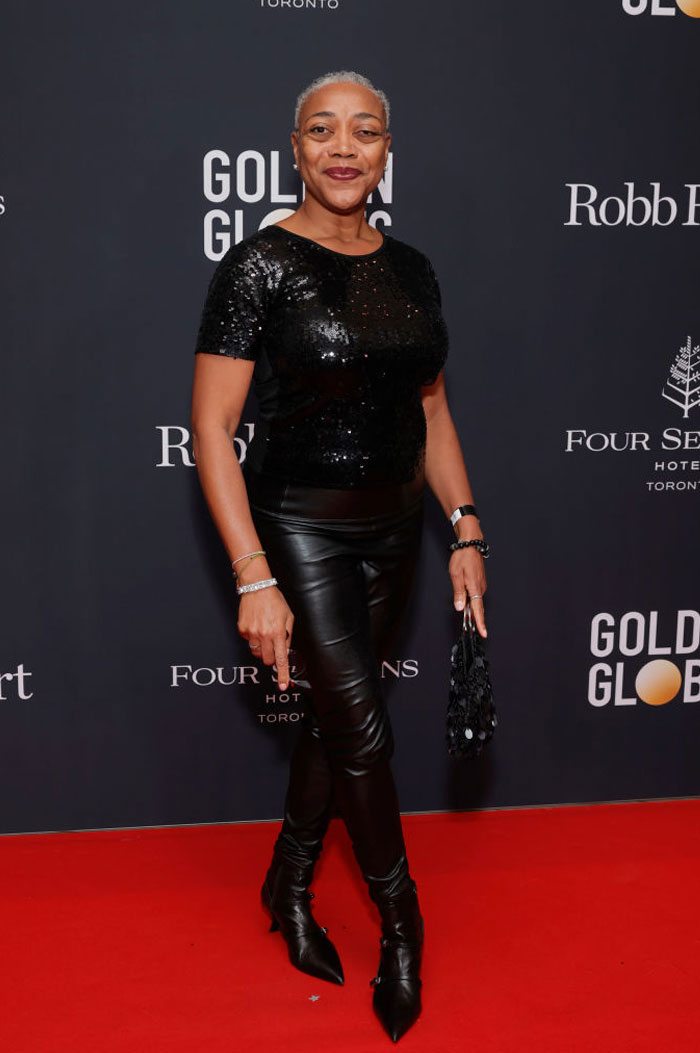 Karen Robinson in black sequin top on a red carpet, promoting Amazon&rsquo;s Alex Cross television show and its cast.