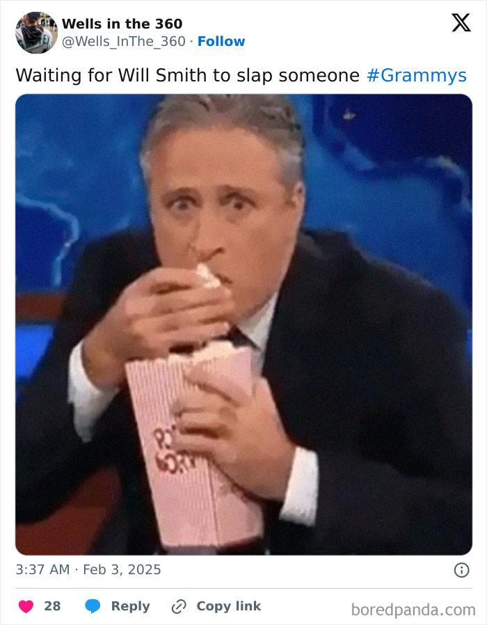 Man eating popcorn, reacting humorously to the 2025 Grammys with suspense and excitement, referencing a past award show moment.