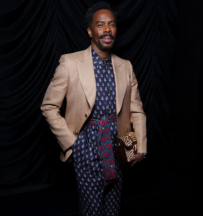 A person in patterned attire at Met Gala; dress code described as "tone deaf. A person in patterned attire at Met Gala; dress code described as "tone deaf.