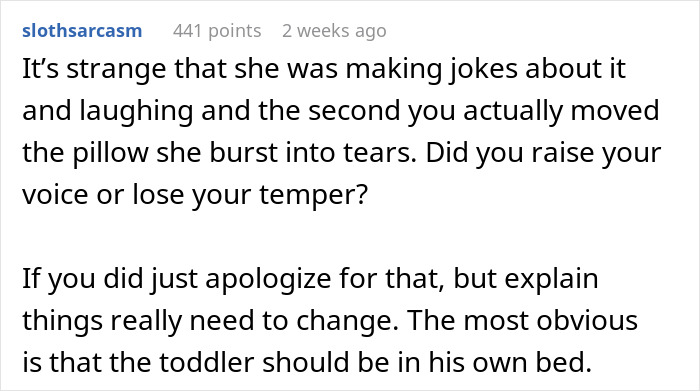 Reddit comment discussing a wife moving into the toddler's room after a disagreement over pillow space.
