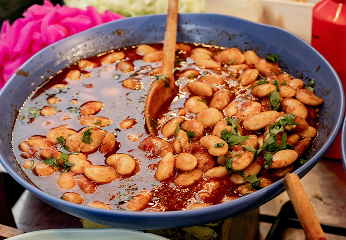 A pot of beans with herbs, part of a humorous anti-woke prank appreciated online. A pot of beans with herbs, part of a humorous anti-woke prank appreciated online.
