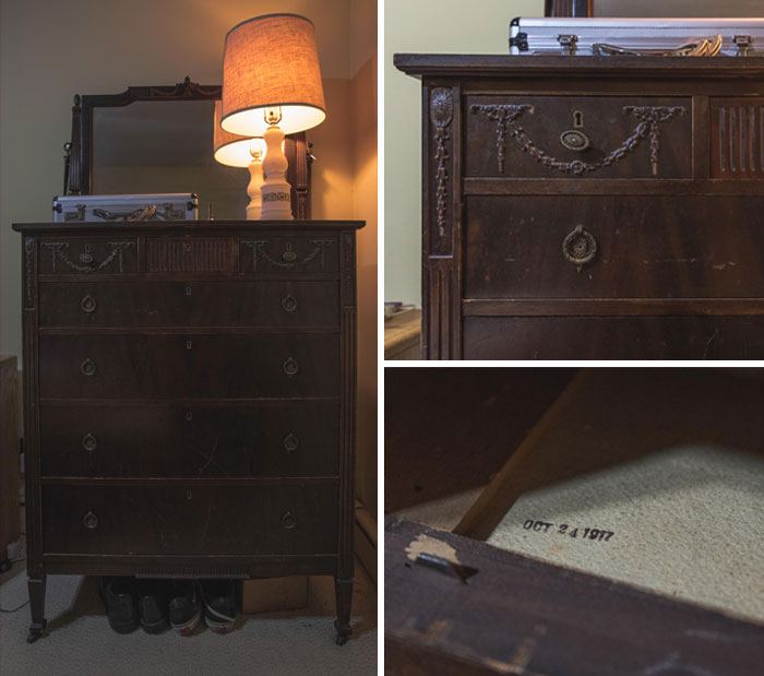 Vintage dresser with ornate details and a date stamp, showcasing cool-old-things in a warmly lit room.