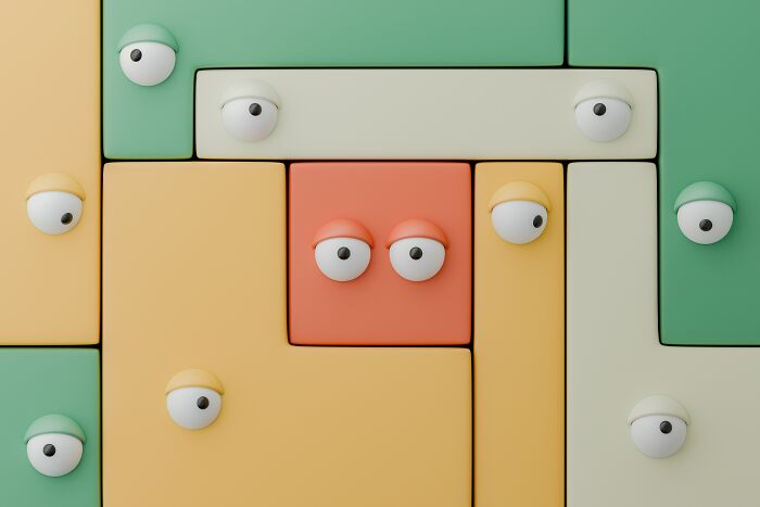 Colorful blocks with cartoon eyes, resembling a playful yet eerie design, symbolizing creepy things kids might say.