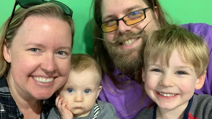 Matthew Van Andel, a former Disney engineer smiling with family.