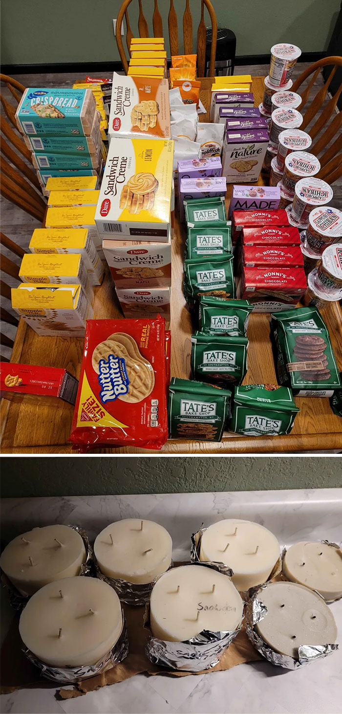 Assorted snacks and candles found while dumpster diving, showcasing unexpected valuable items.