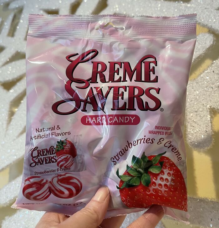 Bag of Creme Savers, a nostalgic 90s food item, showing strawberries & creme flavor packaging.