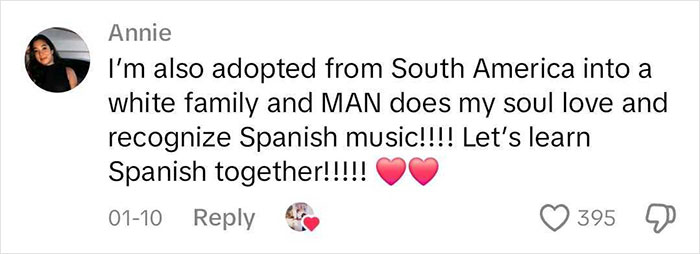 Comment discussing adoption, cultural identity, and love for Spanish music, with reactions and heart emojis.