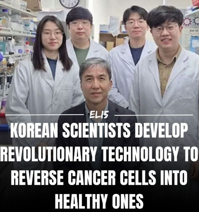 Scientists in a lab, showcasing revolutionary technology to reverse cancer cells.