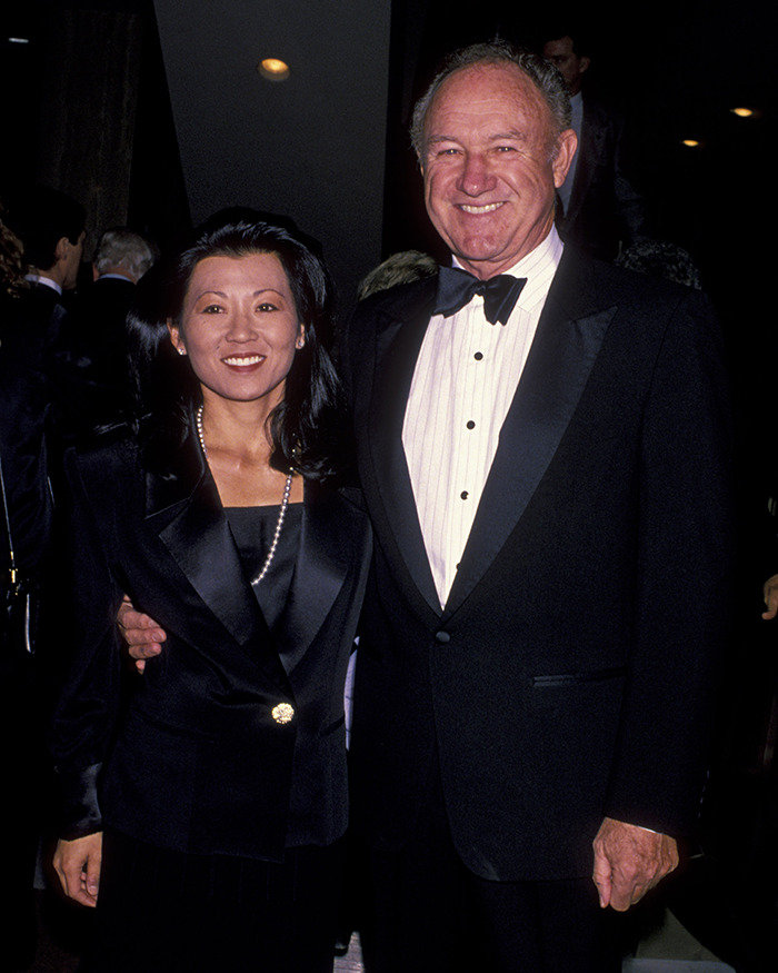 Gene Hackman and Betsy Arakawa in formal attire at an event.