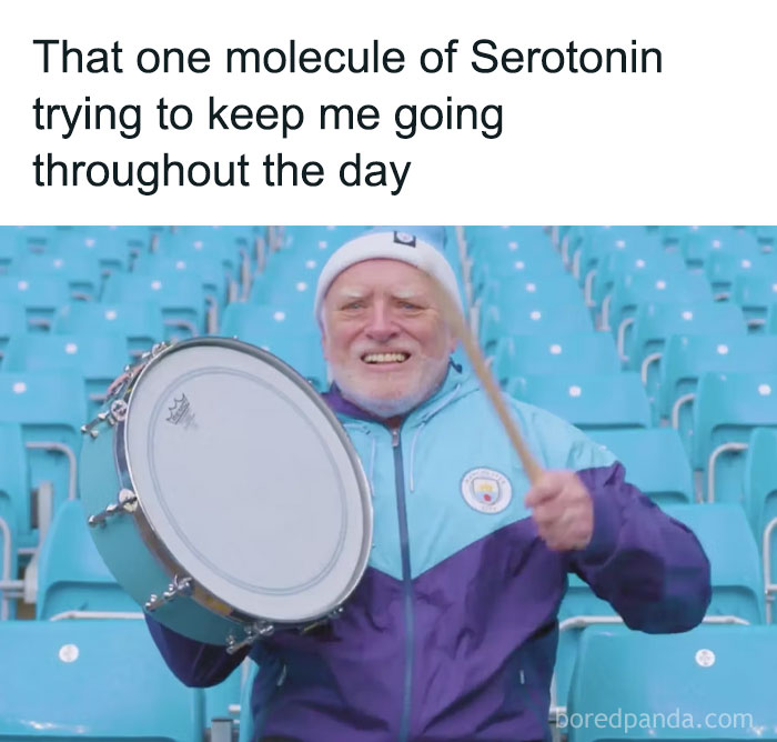 Older man in a stadium energetically playing a drum, symbolizing dopamine helping keep motivation going during the day.