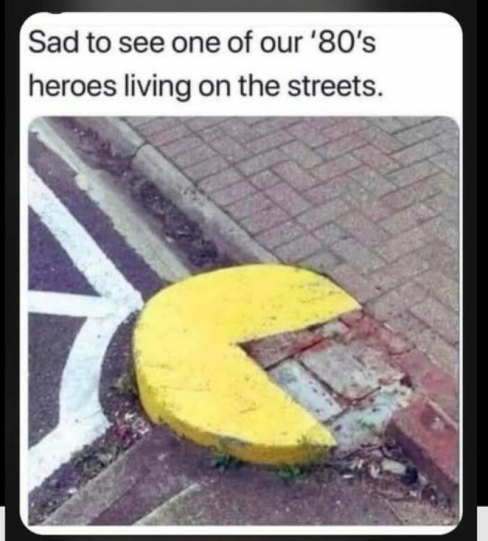 Yellow street curb resembling a video game character, part of funny memes collection online.