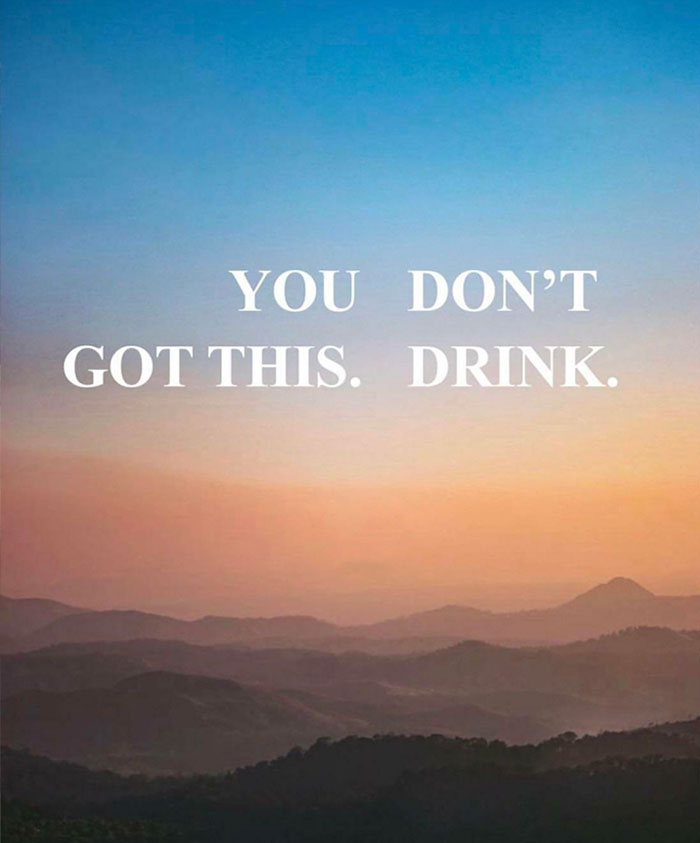Funny sign fail against a scenic sunset background, reading "You don’t got this. Drink."