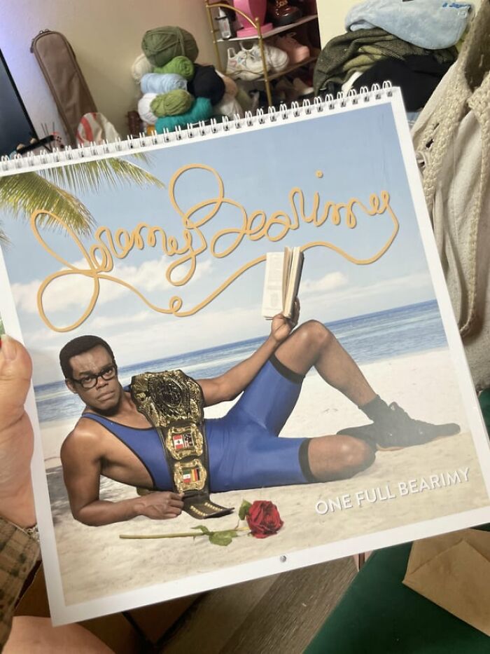 Unique gift idea: a humorous beach calendar featuring a man in a wrestling outfit with a championship belt and a rose.