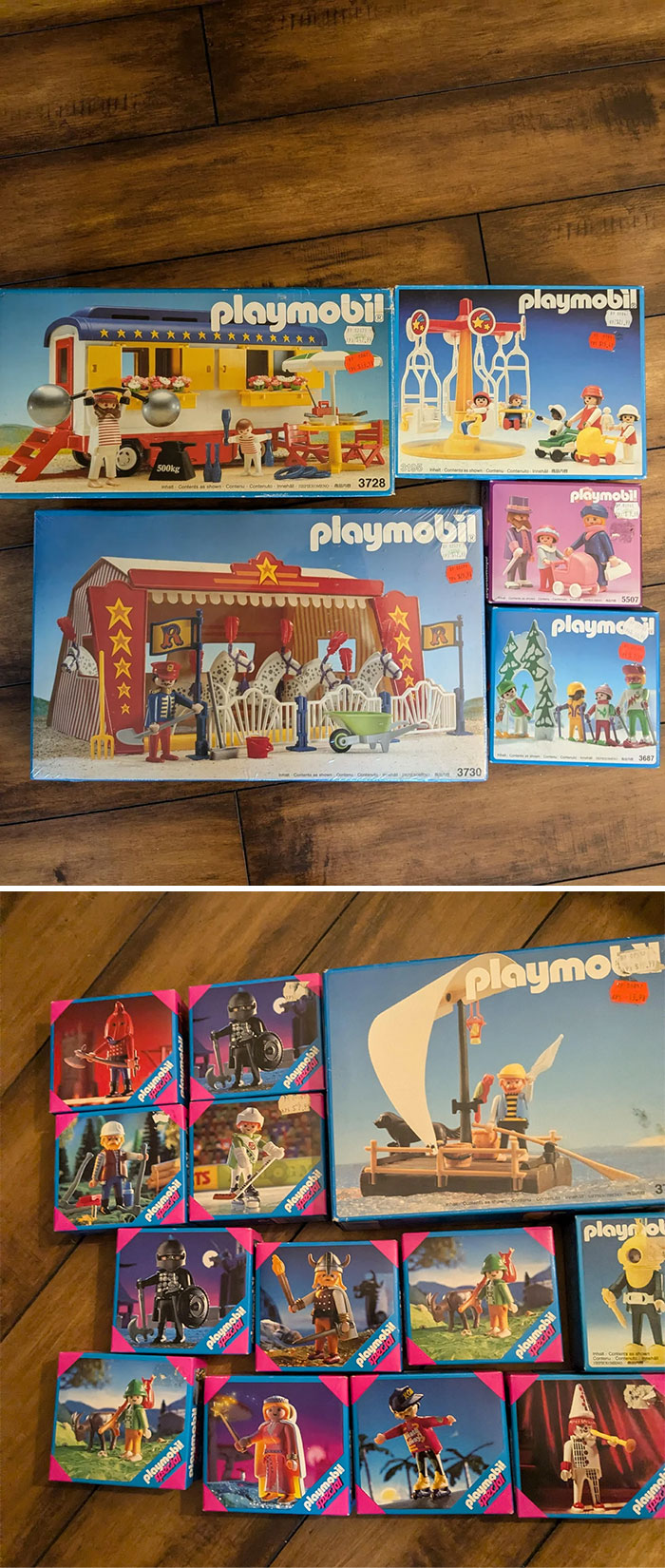 Vintage Playmobil toy sets on a wooden floor, showcasing nostalgic childhood toys.