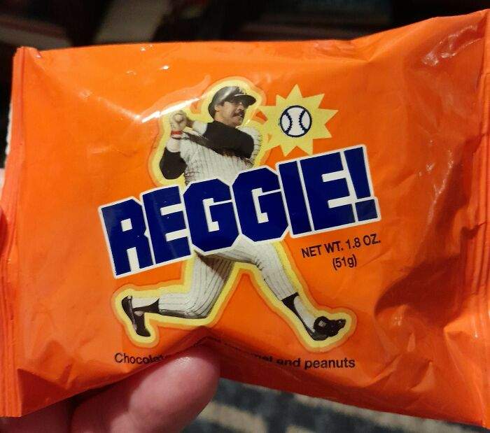 Vintage Reggie candy bar wrapper, a nostalgic food item from the 90s and 2000s.
