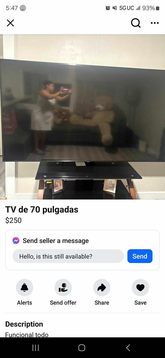 70-inch TV listing on Facebook Marketplace with reflection showing seller.