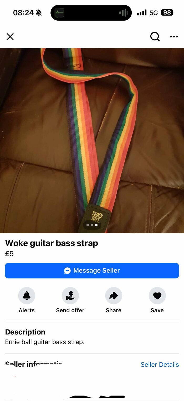 Rainbow guitar strap listed on Facebook Marketplace.