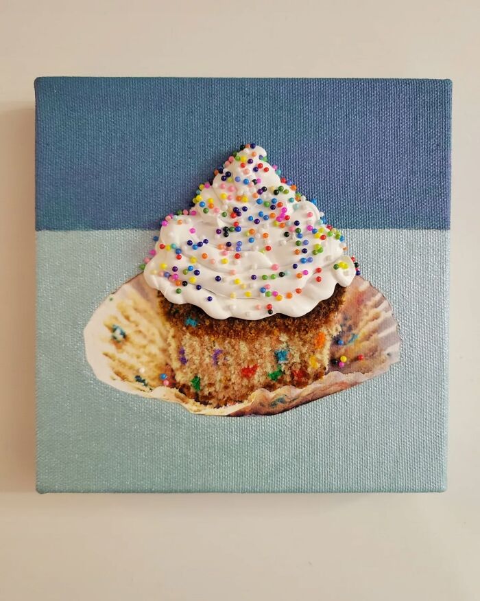 Hyper-realistic embroidered dessert art by Heather Ríos, featuring a cupcake with colorful sprinkles on a blue canvas.