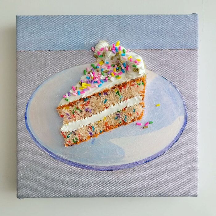 Hyper-realistic embroidered dessert depicting a slice of colorful sprinkle cake on a plate.