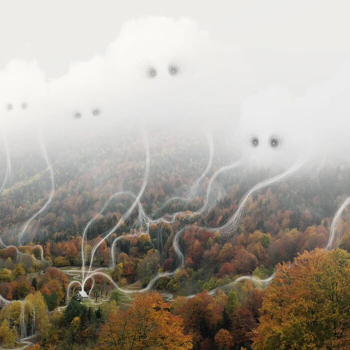 Cloud creatures above a colorful autumn forest, part of Vorja Sánchez's "Interventions" artwork series.