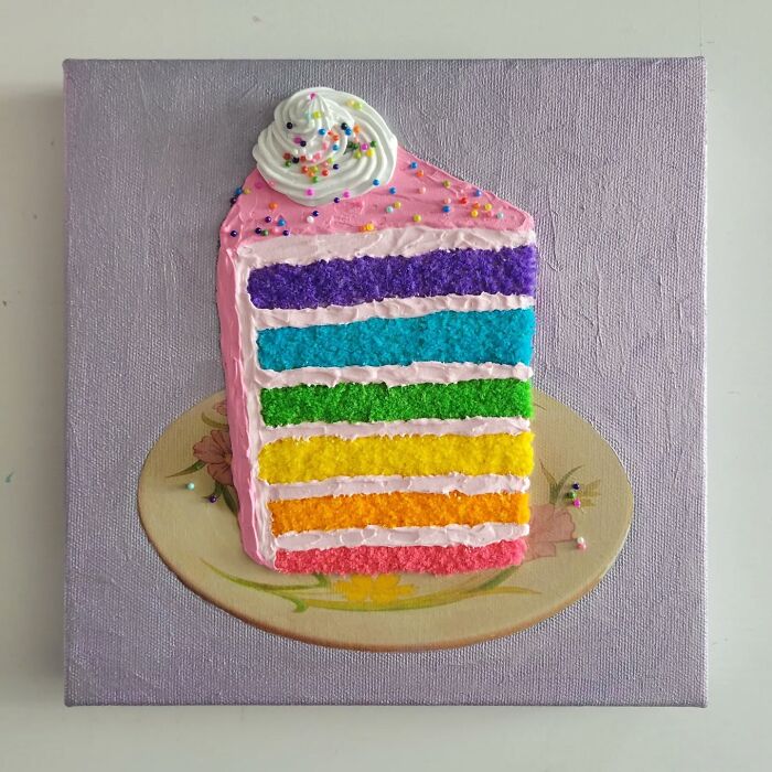 Hyper-realistic embroidered dessert depicting a colorful, layered cake slice with sprinkles on top.