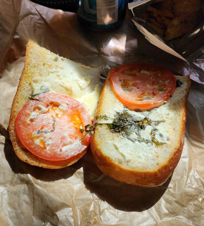 Open sandwich with sparse toppings, highlighting food scams concept.