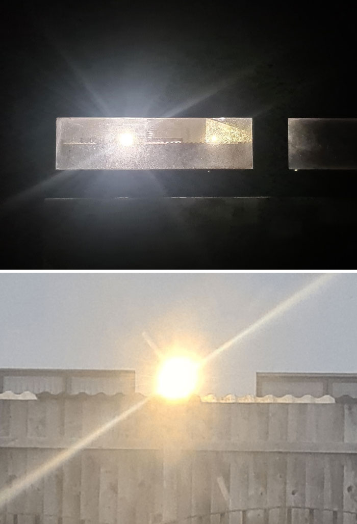 Bright light shining through a fence crack, showcasing terrible neighbors' lack of consideration.