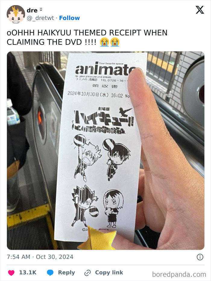 Haikyuu themed receipt with anime characters, part of interesting receipts people found, held by a person on an escalator.