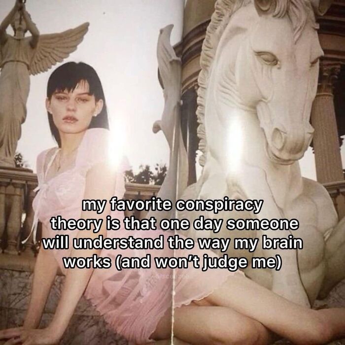 Woman in a pink dress beside a horse statue with a humorous meme text, capturing relatable "just girly things".