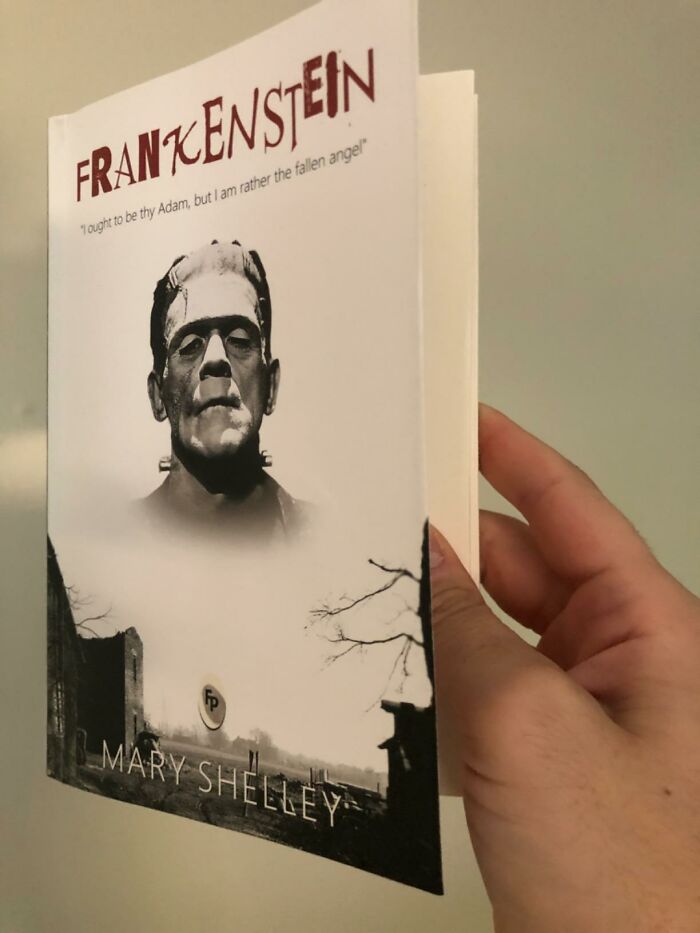 "Cover of Mary Shelley's Frankenstein with notable book quote held by a person."