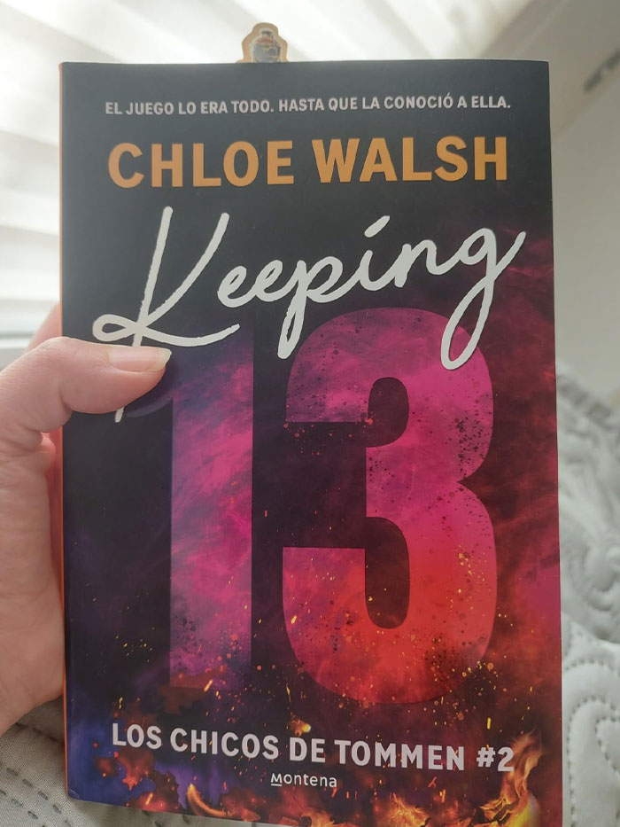 Book cover of "Keeping 13" by Chloe Walsh, featuring bold typography and fiery design elements.