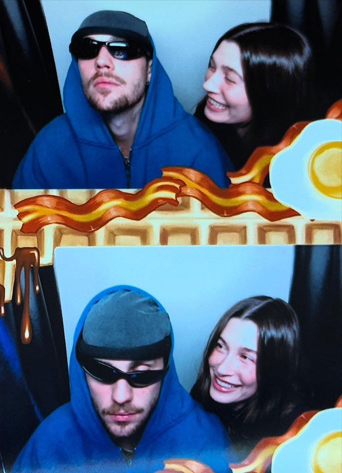 A person in sunglasses and a hoodie with a smiling woman in a photo booth setting, featuring waffle and egg illustrations.