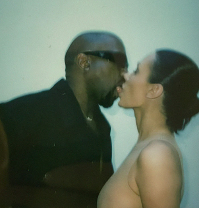 Two people embracing closely, sharing an intimate moment during Bianca Censori&rsquo;s afterparty.