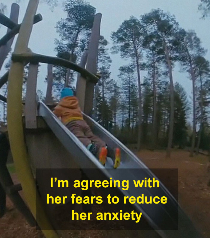 Child on a slide in a forest with a text overlay discussing overcoming fears using negative reinforcement.