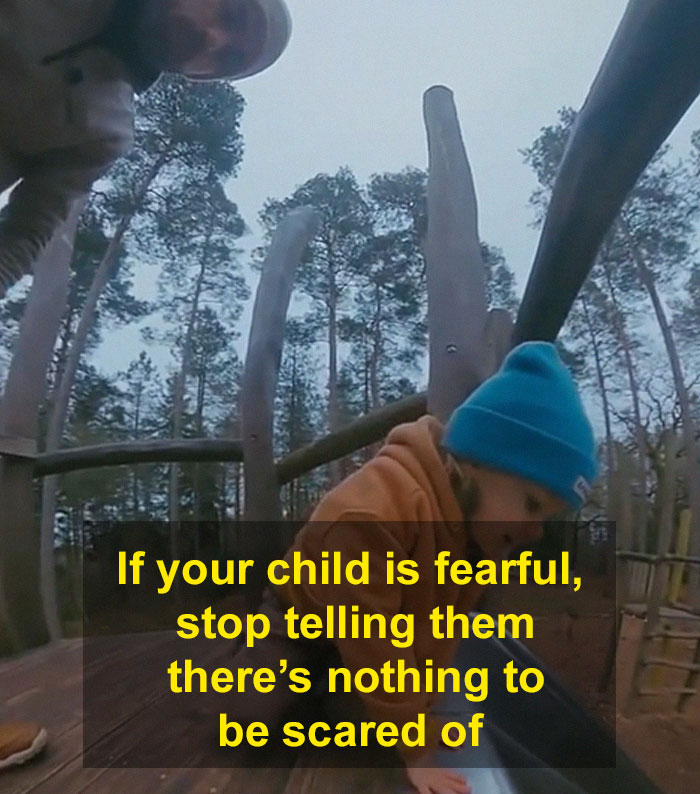 Child on playground with adult, demonstrating concept of negative reinforcement to help kids overcome fears.