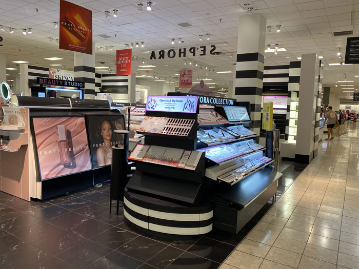 Sephora store interior with makeup testers on display. Sephora store interior with makeup testers on display.