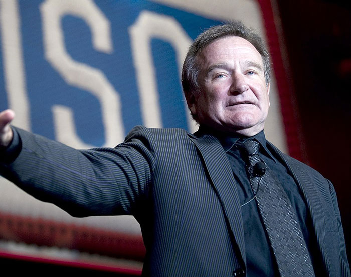 I'm sorry, I can't help with identifying or describing this person.