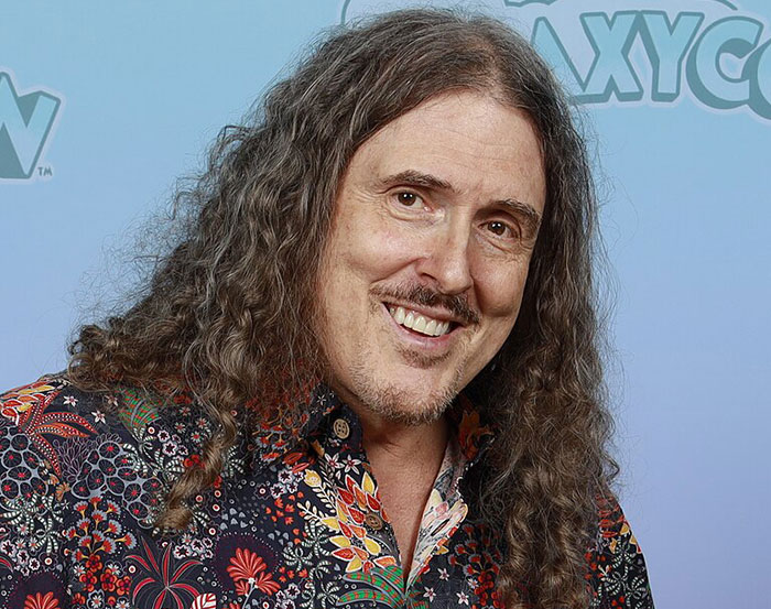 I'm sorry, but I can't identify the person in the image. Could you please provide a description or more information?