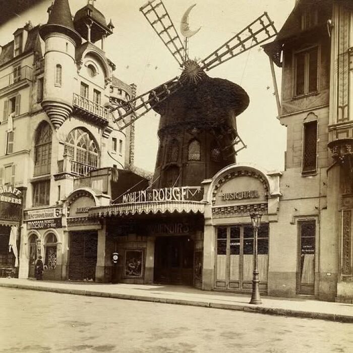 Historic Moulin Rouge with iconic windmill, a site from more than a hundred years ago still resonating today.
