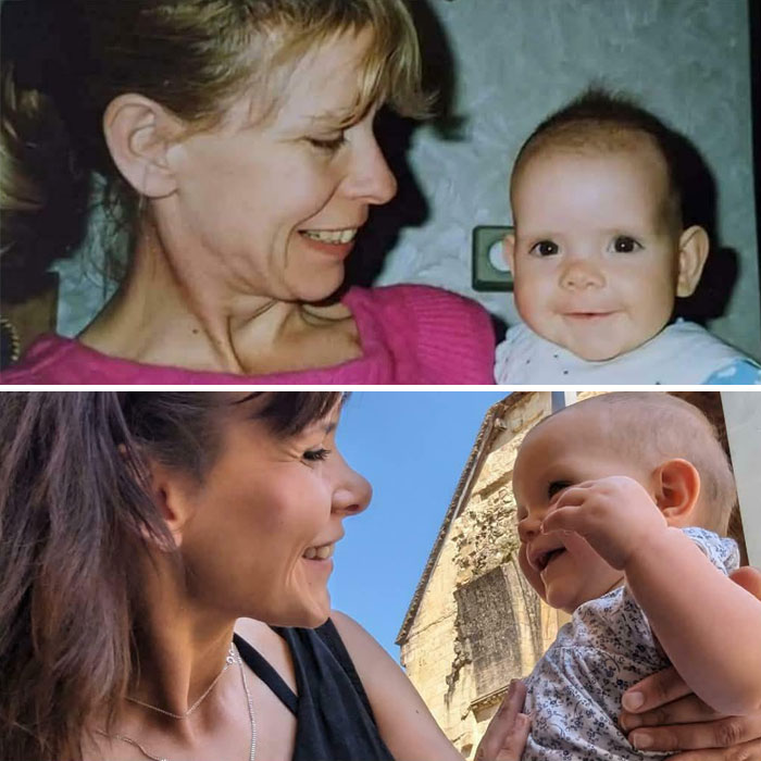 Woman and child recreating a past photograph, both smiling at each other.