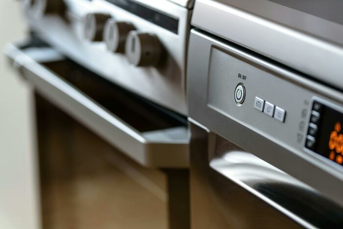 Modern kitchen appliances exemplifying self-paying-products with advanced digital controls and sleek design.
