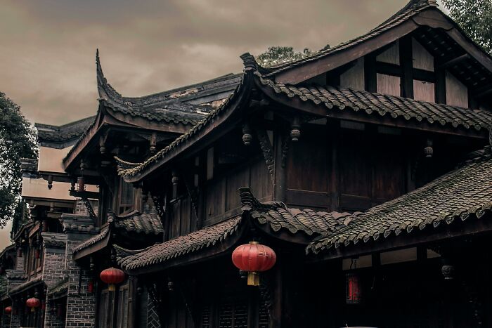 Traditional Asian architecture with red lanterns showcasing cultural differences.